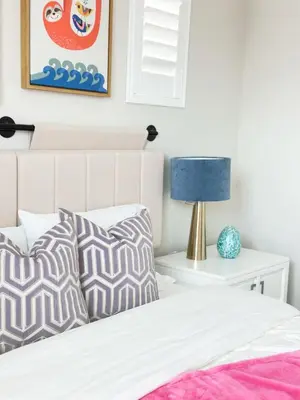 a bedroom with a white bed with pillows and a lamp at Close to UCI 4b&4b villa Irvine eastwood in Irvine