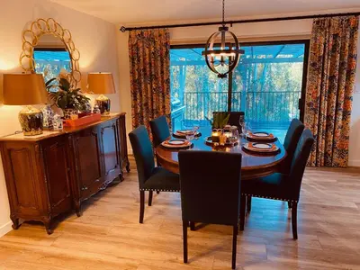 a dining room with a table and chairs and a window at Quiet Retreat With Pool And Hot Tub in Escondido