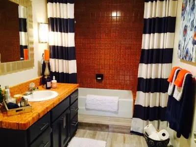 a bathroom with a tub and a sink and a shower at Quiet Retreat With Pool And Hot Tub in Escondido