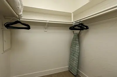 a tie hanging on a wall in a room at Beachfront Retreat in Oceanside