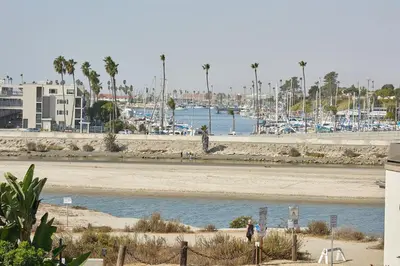 a body of water with boats in a marina at Oceanside Beach Condos in Oceanside