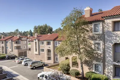 arial view of a row of apartment buildings at Rancho Penasquitos 1br w pool gym nr bars SAN-31 in San Diego