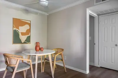 a dining room with a table and two chairs at Rancho Penasquitos 1br w pool gym nr bars SAN-31 in San Diego