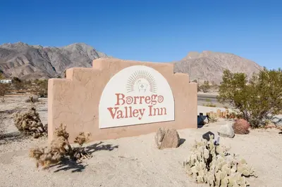 a sign for the bryce valley inn in the desert at Borrego Valley Inn in Borrego Springs