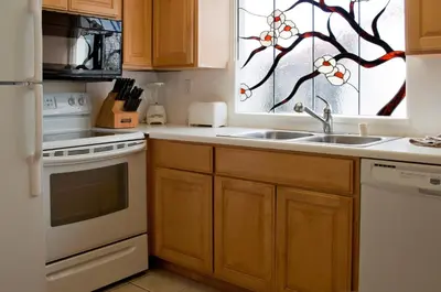 a kitchen with a sink and a window at Casa De La Playa in San Diego