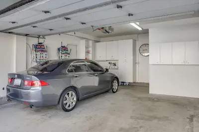 a silver car parked in a garage at Stunning South Mission Beach Home - AC, Private Patio, Grill and Garage! in San Diego