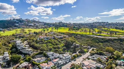 an aerial view of a city with houses and trees at Coastal La Jolla Luxury - AC & Large Ocean View Patio! in San Diego