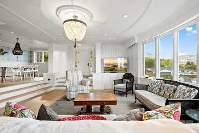 a living room with a couch and chairs and a table at Coastal La Jolla Luxury w AC, Patios, & Massive Ocean Views! in San Diego