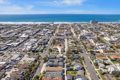 an aerial view of a city with houses and the ocean at Pacific Beach Dreaming - AC, walk 2 town, garage & beach in San Diego