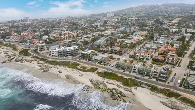 an aerial view of the beach and the ocean at Coastal retreat near the beach w Panoramic Ocean Views, Rooftop Deck, & Firepit in San Diego