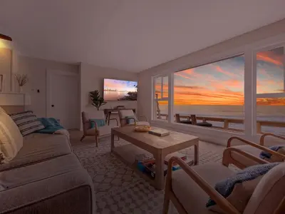 a living room with a view of the ocean at Oceanfront Paradise - Spa, Pet-Friendly, Fast Wifi, Parking & Dream Views in San Diego