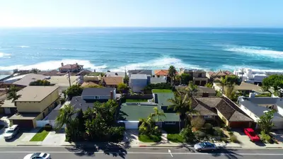 an aerial view of a residential neighborhood with the ocean at Bird Rock Dreams - Ocean Views, Massive Yard, Outdoor Dining, Fast Wifi & AC! in San Diego