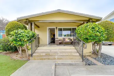 a home with a staircase leading to a house at La Jolla Oasis - Pet Friendly, Large Backyard, Walk2Beach & Location! in San Diego