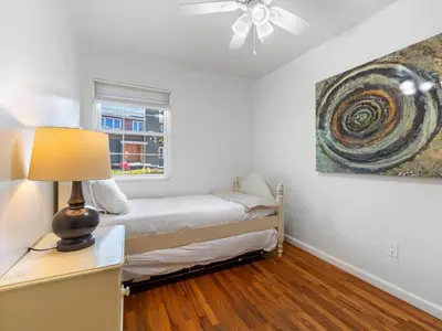 a bedroom with a bed and a window at La Jolla Ocean Dream - Walk 2 Beach - Dog Friendly in San Diego