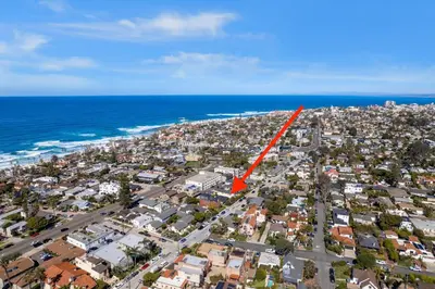 an aerial view of a city with a red arrow at La Jolla Ocean Dream - Walk 2 Beach - Dog Friendly in San Diego
