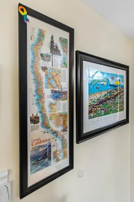 two framed maps hanging on a wall at Mile to Beach! Tiki Master Suite in Oceanside