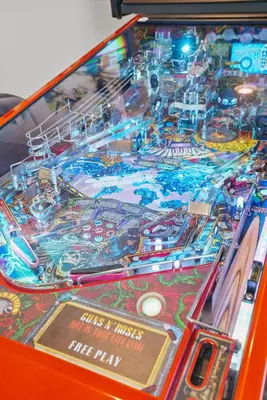 a close up of a pinball game in a machine at Bay View Dream - Steps to Bay, Rooftop Patio & AC in San Diego