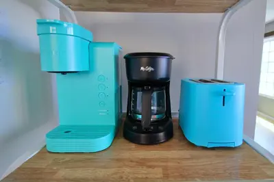 a coffee maker and a blender sitting on a counter at Sea View Escape Unit #2 in San Clemente