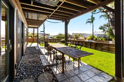 a patio with a table and chairs on a house at The Beachside Hideaway 3 blocks From The Beach! in Encinitas