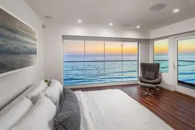 a living room with a couch and a chair at Ocean Dreamin in Encinitas
