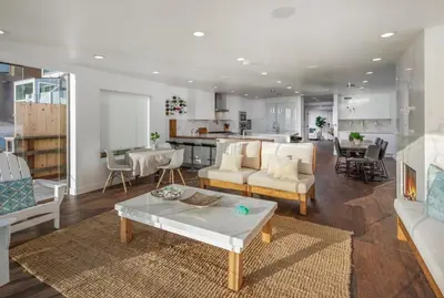 a living room with a couch and a table at Ocean Dreamin in Encinitas