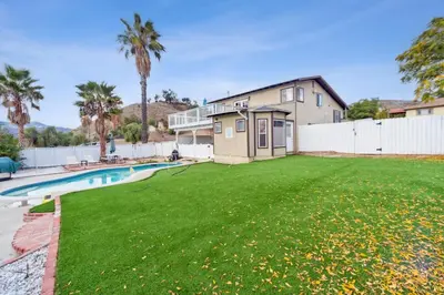 a large yard with a pool and a house at Paradise On Earth residence in Lake Elsinore