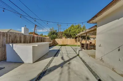 a house that is being remodeled with a concrete slab at Walkable Chula Vista Home with Covered Patio in Chula Vista