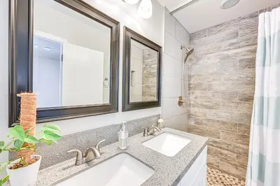 a bathroom with a sink and a mirror at Walkable Chula Vista Home with Covered Patio in Chula Vista