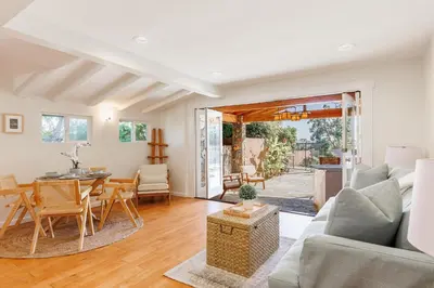 a living room with a couch and a table at CBS-501 - Cardiff Hillside Hideaway in Cardiff-by-the-Sea