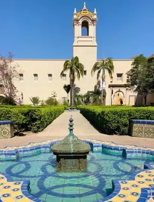 a fountain in front of a building with a clock tower at 4BR Spectacular Harbor View Modern Home 5min Zoo in San Diego