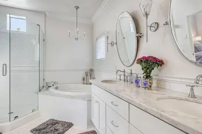 a bathroom with two sinks and a tub and a shower at 4BR Spectacular Harbor View Modern Home 5min Zoo in San Diego