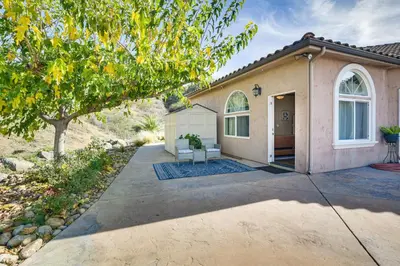 a home in the desert with a patio at Cozy Alpine Cottage Near Casinos and Trails! in Alpine