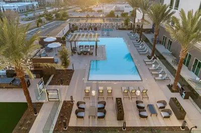 an overhead view of a pool at a resort at SpringHill Suites by Marriott Chula Vista Eastlake in Chula Vista