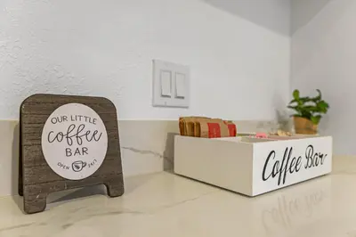a sign for a coffee bar next to a box at Brand New home in San Diego 3BR Quiet neighborhood near Downtown/Seaworld/Zoo in San Diego