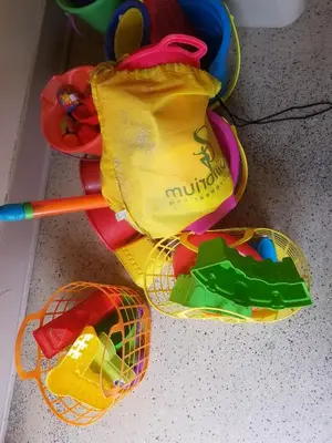 a pile of toys sitting on a table at Amazing Location - Large and Luxurious 1 Bedroom Beach Condo By Beaches and Attractions in Solana Beach