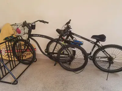 two bikes parked next to each other in a room at Amazing Location - Large and Luxurious 1 Bedroom Beach Condo By Beaches and Attractions in Solana Beach