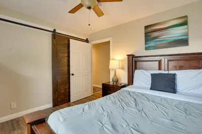 a bedroom with a bed and a ceiling fan at Pet-Friendly Temecula Home in Wine Country! in Temecula