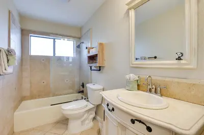 a bathroom with a sink and a toilet and a tub at Pet-Friendly Temecula Home in Wine Country! in Temecula