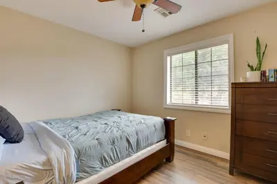 a bedroom with a bed and a dresser and a window at Pet-Friendly Temecula Home in Wine Country! in Temecula