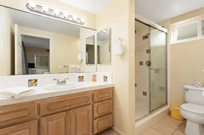 a bathroom with a sink and a shower at Oceanfront 3-unit complex - Private Deck - BBQ in Oceanside