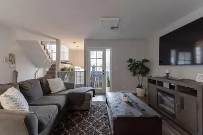a living room with a couch and a table at Not taking reservations in Chula Vista