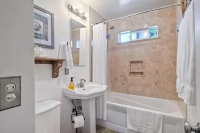 a bathroom with a sink and a shower and a toilet at Walk To Beach - BBQ - Fire Pit - Outdoor Dining in Carlsbad