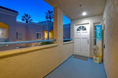 a view of the front door of a villa at Ocean View, Pool, Hot Tub, Steps To Pier, Gated in Oceanside