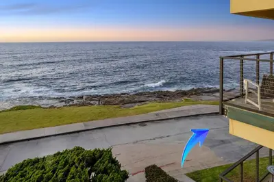 a view of the ocean from the balcony of a house at Sur La Mer, beachfront, tidal pools in San Diego