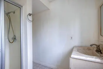 a bathroom with a sink and a shower at Blueground Mission Valley w gym pool SAN-43 in San Diego