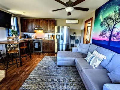 a living room with a couch and a kitchen at #2 - The Eagle's Perch in Pauma Valley