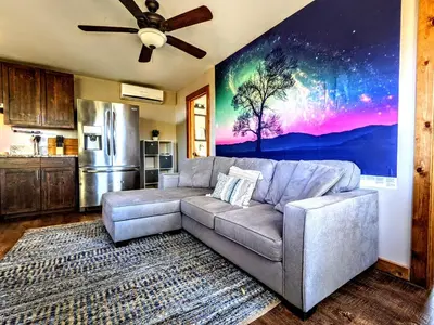 a living room with a couch and a kitchen at #2 - The Eagle's Perch in Pauma Valley