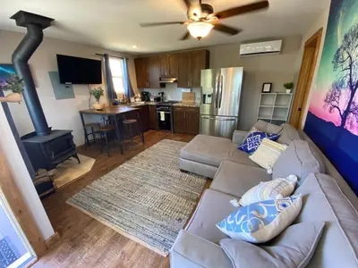 a living room with a couch and a stove at #2 - The Eagle's Perch in Pauma Valley