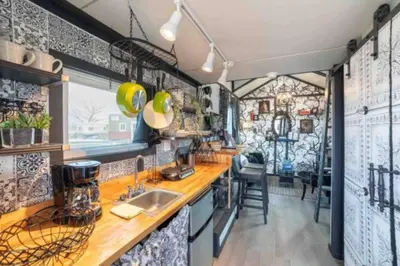 a kitchen with a counter and a sink in a room at #13 - The Raven - Tiny Home (Edgar Allan Poe) in Santa Ysabel