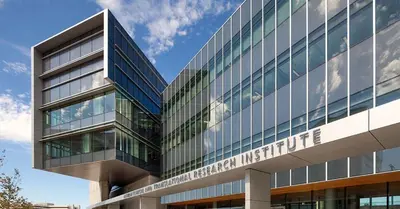a building with a sign on the side of it at SPECIAL OFFER - Modern Apartment in La Jolla UTC - Close to Beaches, Shopping, Dining, UCSD in San Diego